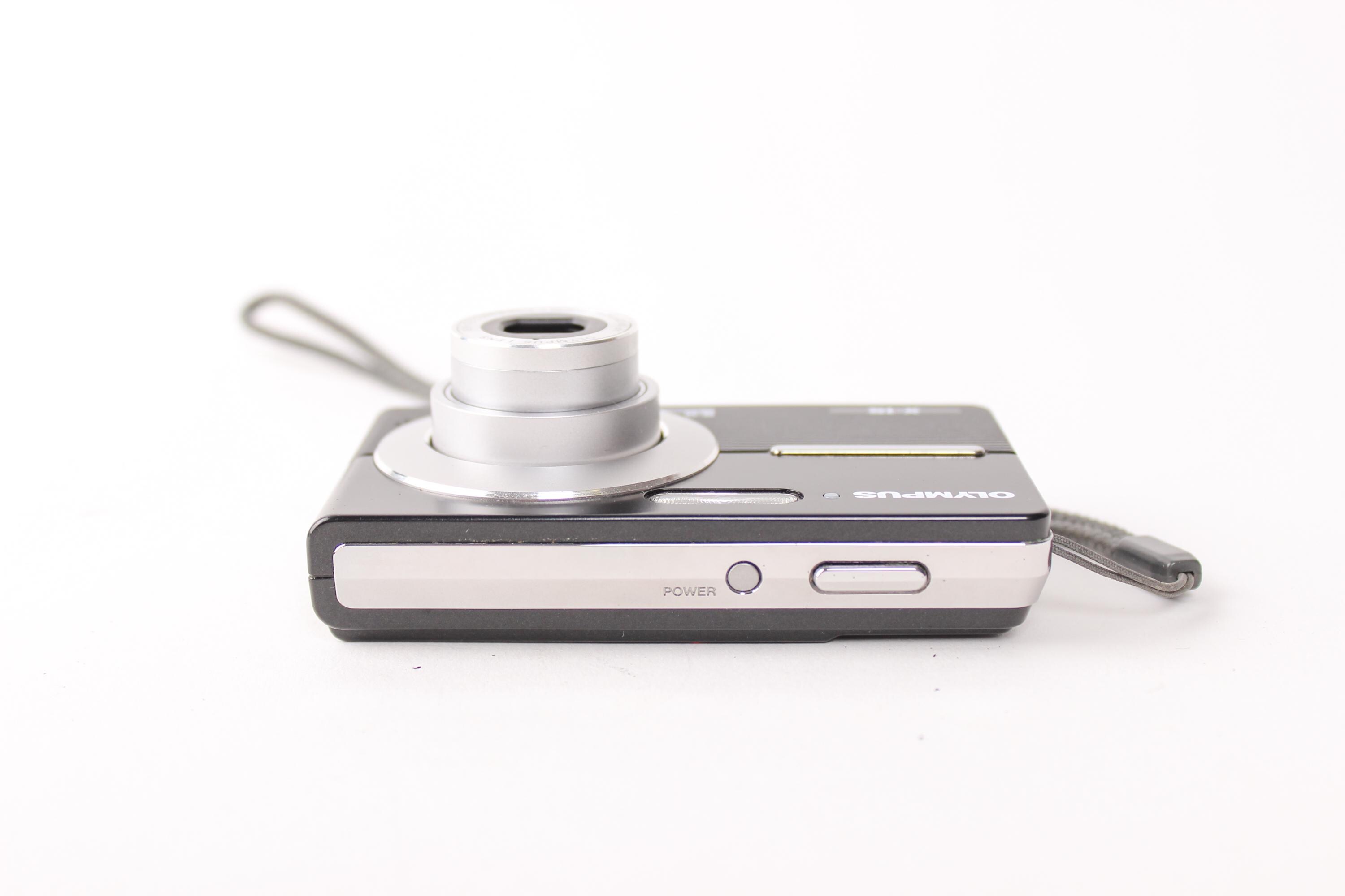 Retro Olympus X-15 compact 8MP vintage digital camera with 3x