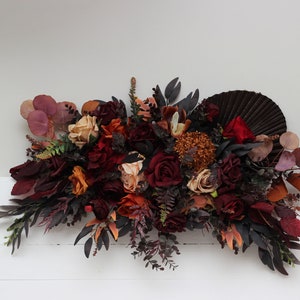 Arch arrangement Boho terracotta flowers Burgundy rust brown Archway Halloween wedding Wedding floral arrangement
