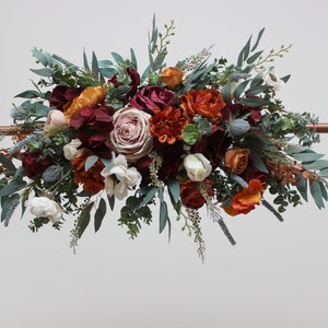 Rust burgundy arch flowers Fall wedding Orange burgundy wedding Arbor flowers Archway Wedding flower arch Floral arrangement Pergola flowers