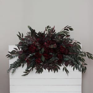 Moody burgundy arch arrangement with eucalyptus Arch flowers Fall wedding Archway flowers Pergola flowers Wedding arch