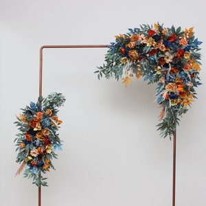 Dark teal rust bouquet Navy blue orange flowers Archway flowers Pergola flowers Wedding arch arrangement