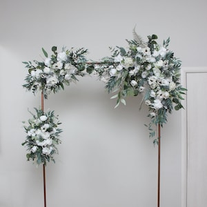 White roses anemones Blue thistle Classic wedding Flower arch arrangement  Wedding flowers Floral arrangement Arbor flowers Archway