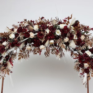 Burgundy brown cream arch arrangement Arch flowers Fall wedding Deep red ivory archway flowers Pergola flowers Wedding arch