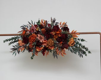 Rust burgundy cinnamon orange flowers Boho arch flowers Floral arch arrangement Fall wedding Boho wedding Wedding corner swag Faux flowers