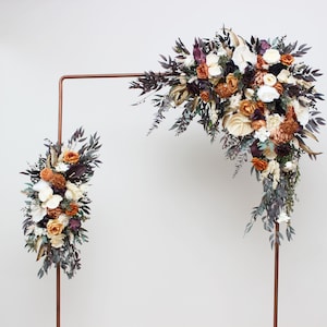 Deep purple terracotta beige flowers Archway flowers Pergola flowers Wedding arch arrangement Arch flowers