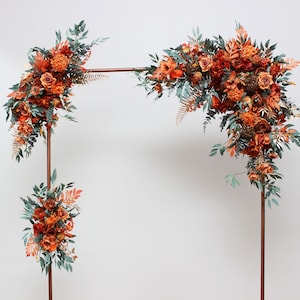 Rust Terracotta Burnt orange flowers  Fall wedding  Flower arch arrangement Wedding flowers Floral arrangement Arbor flowers Archway