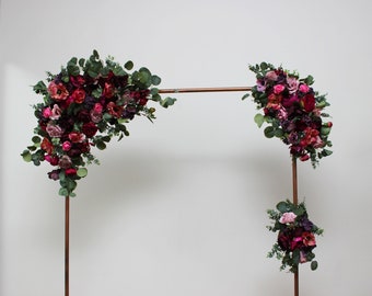 Deep purple hot pink flowers Archway Boho wedding Wedding floral arrangement