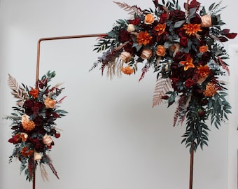 Burnt orange red protea wedding flowers  Archway flowers Pergola flowers Wedding arch arrangement