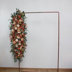 Rust orange floral arch arrangement Fall wedding Boho wedding Wedding arch flowers Pergola flowers  Flowers forsweetheart table