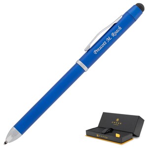 May include: A blue Cross pen with a silver clip and a stylus on the top. The pen is engraved with the name "Prescott M. Roach". The pen is in a black box with a gold Cross logo.