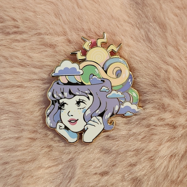 Emaille pin met regenbooggedachten