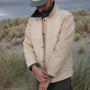 Beginner-friendly chore coat sewing pattern, perfect for creating a durable, Carhartt-style work coat. Easy-to-follow instructions for sewing a versatile barn coat or work jacket. Ideal pattern for novice sewists looking to make a rugged, practical