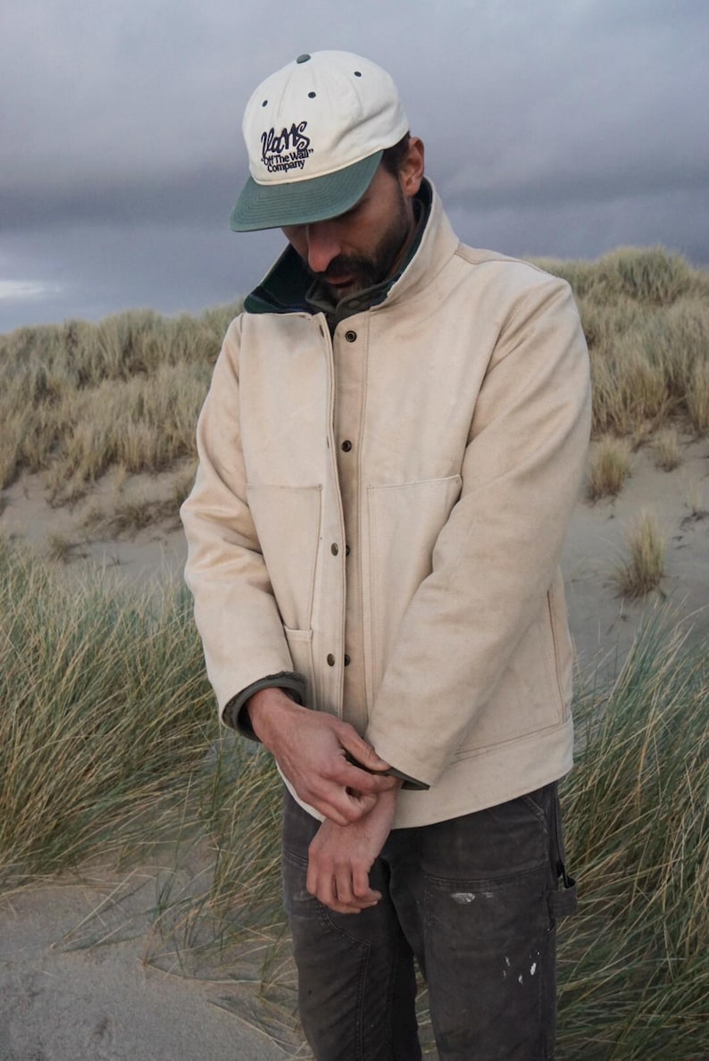 Beginner-friendly chore coat sewing pattern, perfect for creating a durable, Carhartt-style work coat. Easy-to-follow instructions for sewing a versatile barn coat or work jacket. Ideal pattern for novice sewists looking to make a rugged, practical