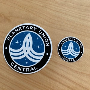 The Orville - Lot de 2 autocollants ou aimants en vinyle avec logo Union planétaire