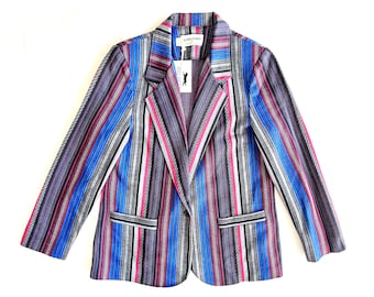 May include: A striped blazer with a blue, pink, and gray pattern. The blazer has a notched collar, long sleeves, and a single button closure. The label on the blazer reads "Alfred Dunner".