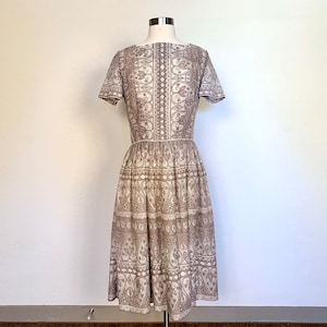 Vintage 1950s L’Aiglon Mediterranean print dress size medium M short sleeve shirt waist square neck pleated midi fit-and-flare floral