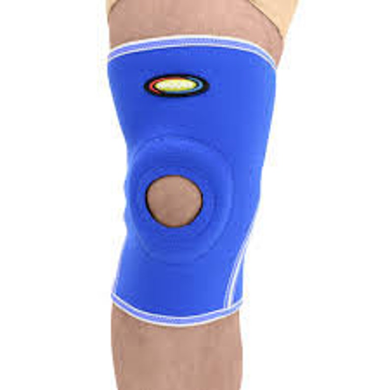 May include: Blue knee support brace with a hole in the center and a small colorful logo on the front.