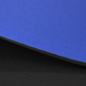 May include: Close-up of two layers of blue and black neoprene fabric. The fabric is smooth and has a slight sheen.