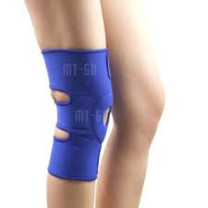 May include: Blue knee support brace with adjustable straps and breathable mesh panels. The brace has the text "MT-GO" printed on it.