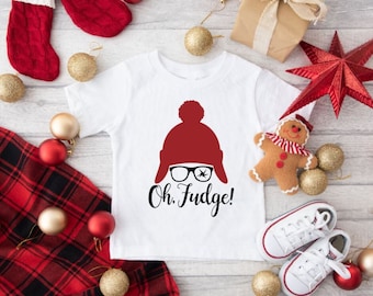 May include: White baby onesie with a red and black graphic of a person wearing a Santa hat and glasses. The text "Oh Fudge!" is printed below the graphic.