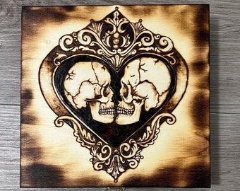 Skulls in heart box