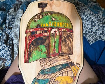 Boba Fett wood burned art.  With a glossy resin coating for protection.