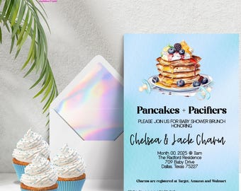 May include: A blue baby shower invitation with a watercolor illustration of a stack of pancakes topped with blueberries, whipped cream, and syrup. The text reads "Pancakes + Pacifiers" and "Please join us for baby shower brunch honoring Chelsea & Jack Charm".