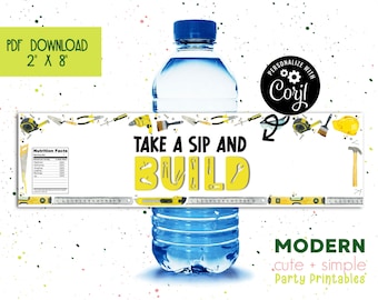 May include: A printable water bottle label with a yellow and black "Take a Sip and Build" design. The label features a variety of tools, including a hammer, saw, and wrench. The label is 2 inches by 8 inches.
