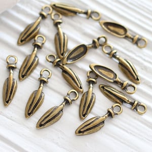 10pc leaf charm, leaf dangles, earring charms, leaf charms for necklaces, antique gold leaf, bracelet charms, mini leaf pendant, tribal leaf