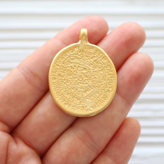 Tribal pendant gold, rustic, boho pendant, spiral pendant, matte gold round pendant, dangle pendant, hammered metal pendant