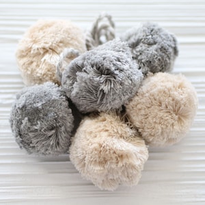 Beige gray pom pom curtain tie back, pom pom purse charm, wall hanging decor, pom pom swag, door knob decor, car charm, pom poms, bag charm