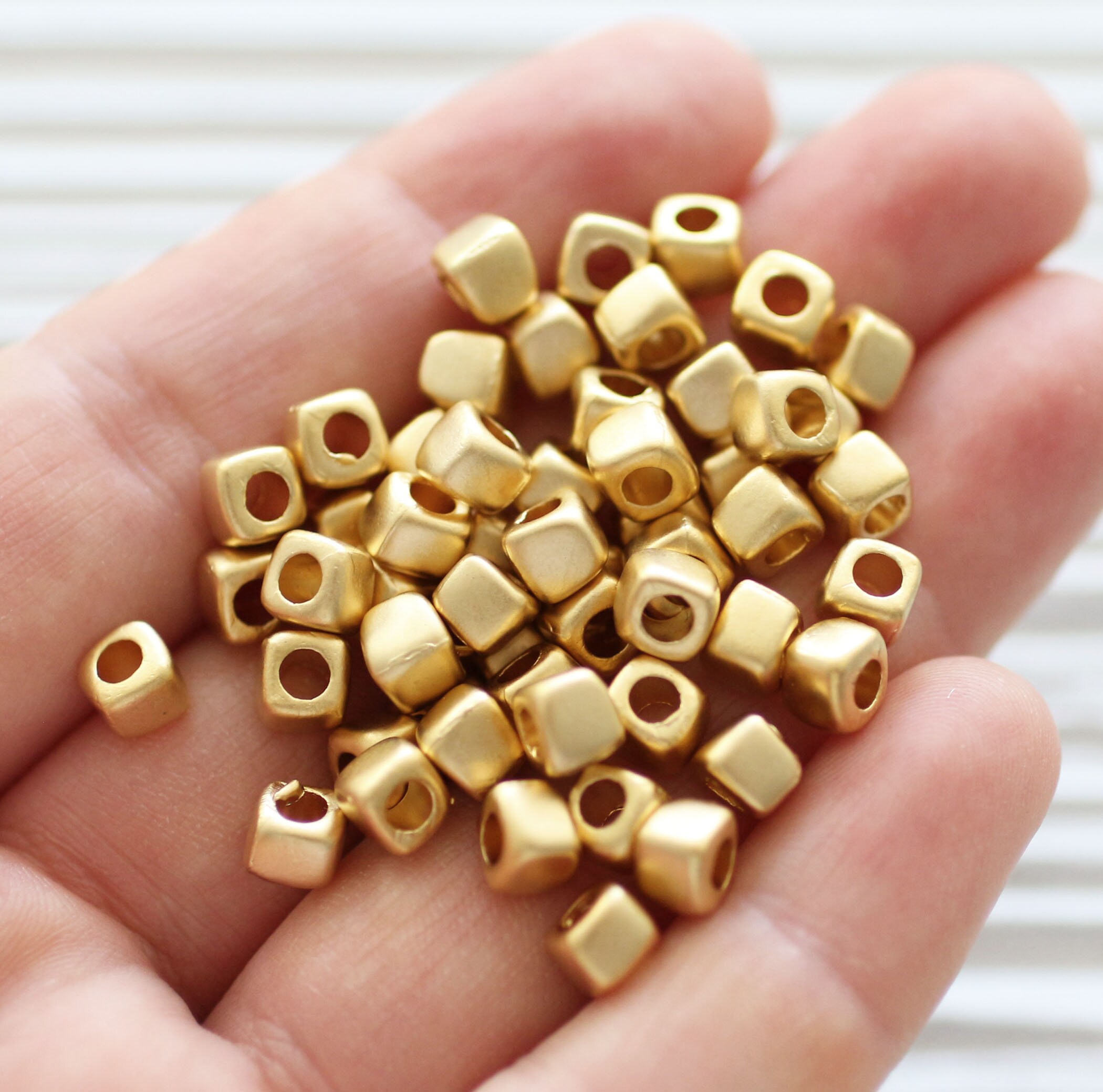 thumbnail image 2 of Striking Copper Plated Hematite Square Spacer Beads – 1x3mm (8 Strands) 2 of 6