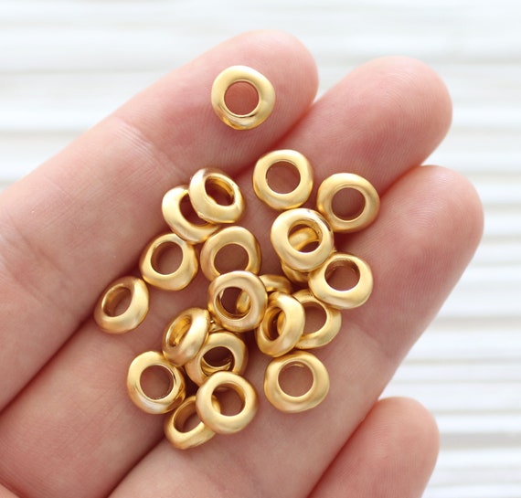 10pc gold heishi beads, organic shaped gold rondelle beads, matte gold beads, metal spacer beads, large hole beads, round beads, M1