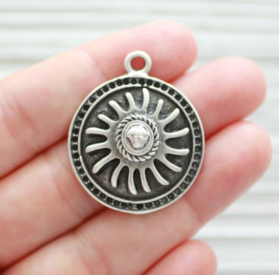 Sun pendant silver, spiral pendant, celestial pendant, hammered pendant with sun in the middle, sunburst pendant