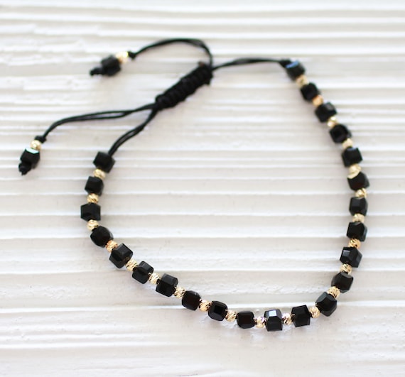WOVEN FRIENDSHIP BRACELET W/CHARMS BLACK WOVEN FRIENDSHIP BRACELET W/CHARMS BLACK