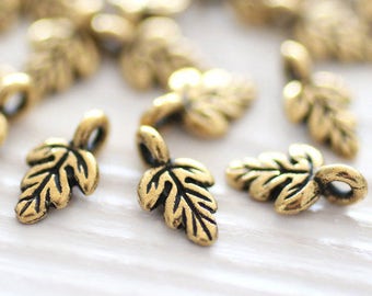 4pc antique gold leaf beads, leaf charm, bracelet charms, gold leaf, mini charms, metal gold beads, metal charms, earring charms, TierraCast