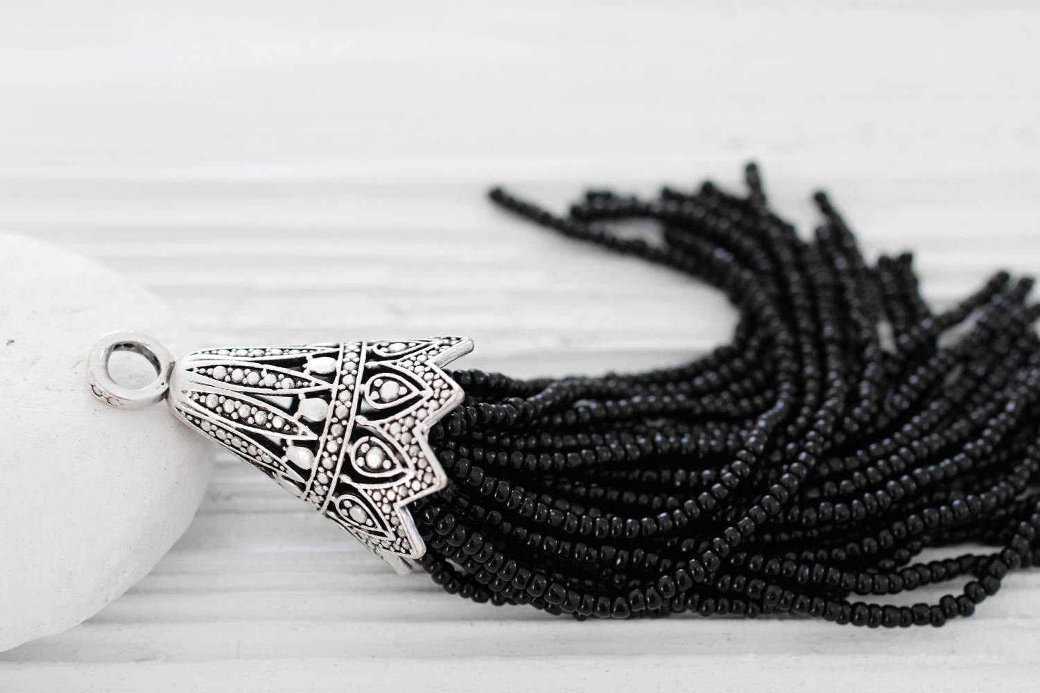 Black beaded tassel with large filigree silver cap, large bead tassel