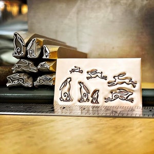 Hares Leaping and Gazing. Six Designs, Three Sizes. Engraved Metal Hand Stamp. image 1