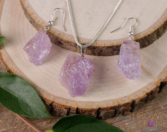 Graduated double point quartz crystal necklace and earring set