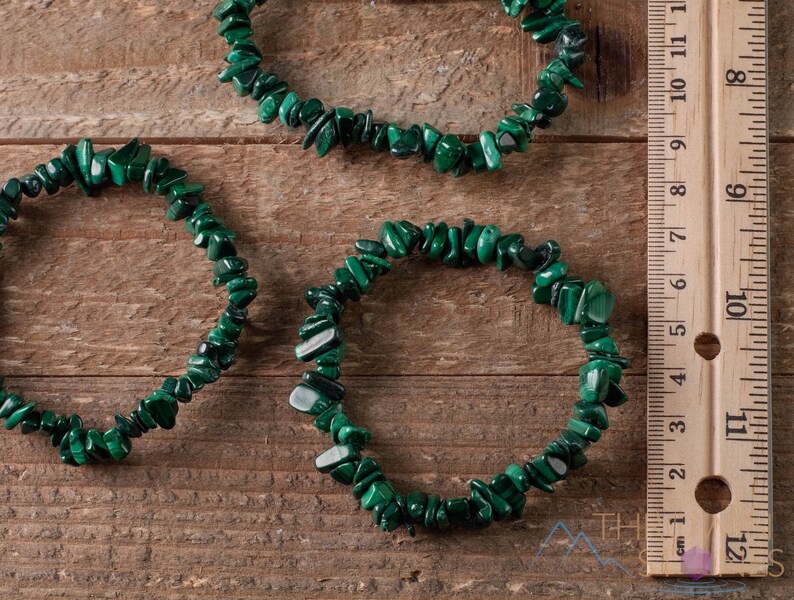 Handcrafted Malachite chip bracelet. These green, tumbled chips, are drilled, and strung on an elastic cord, to create an endless bracelet. Each crystal bracelet is unique in shape, and color, and has a wrist circumference of approximately 6 inches.