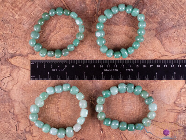 These pale Green Aventurine crystal bracelets have tumbled beads strung on elastic for an endless bracelet.  
Crystals are nature-made therefore each one is unique in appearance.