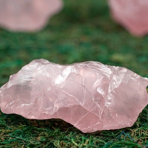 Rose Quartz Raw Crystals. These genuine rough gemstones are pale pink and translucent . Each specimen is unique and will vary in color, shape, and pattern. These specimens are great for crystal grids and crystal decor. This listing has variations.