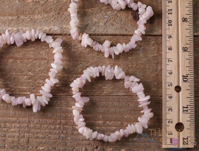 These pale pink Kunzite crystal bracelets have chip beads strung on elastic for an endless bracelet.  
Crystals are nature-made therefore each one is unique in appearance.