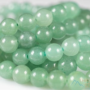 These pastel green Aventurine crystal bracelets have sphere beads strung on elastic for an endless bracelet. 
Crystals are nature-made therefore each one is unique in appearance.