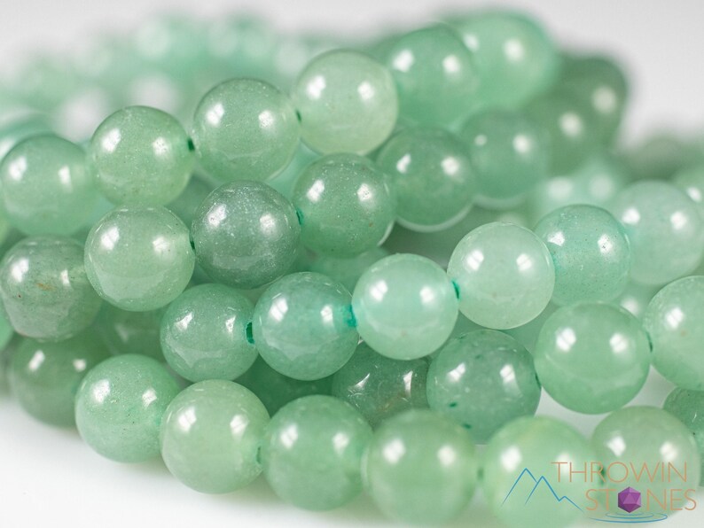 These pastel green Aventurine crystal bracelets have sphere beads strung on elastic for an endless bracelet. 
Crystals are nature-made therefore each one is unique in appearance.