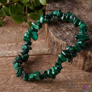 Handcrafted Malachite chip bracelet. These green, tumbled chips, are drilled, and strung on an elastic cord, to create an endless bracelet. Each crystal bracelet is unique in shape, and color, and has a wrist circumference of approximately 6 inches.