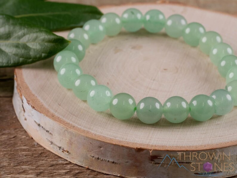 These pastel green Aventurine crystal bracelets have sphere beads strung on elastic for an endless bracelet. 
Crystals are nature-made therefore each one is unique in appearance.