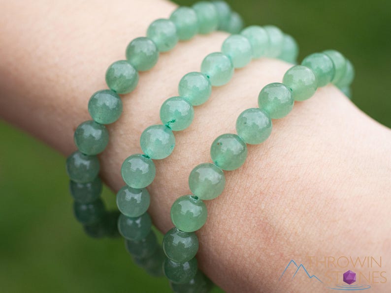 These pastel green Aventurine crystal bracelets have sphere beads strung on elastic for an endless bracelet. 
Crystals are nature-made therefore each one is unique in appearance.