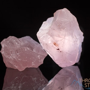 Rose Quartz Raw Crystals. These genuine rough gemstones are pale pink and translucent . Each specimen is unique and will vary in color, shape, and pattern. These specimens are great for crystal grids and crystal decor. This listing has variations.