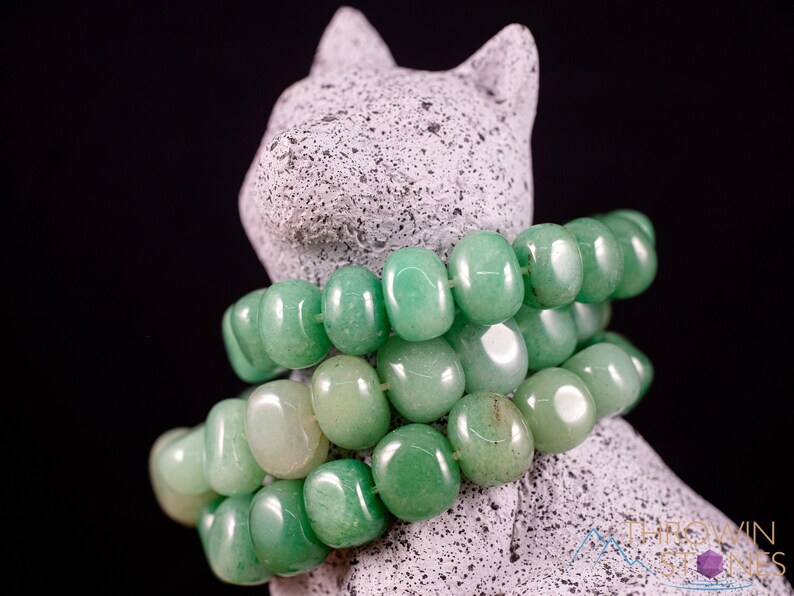 These pale Green Aventurine crystal bracelets have tumbled beads strung on elastic for an endless bracelet.  
Crystals are nature-made therefore each one is unique in appearance.